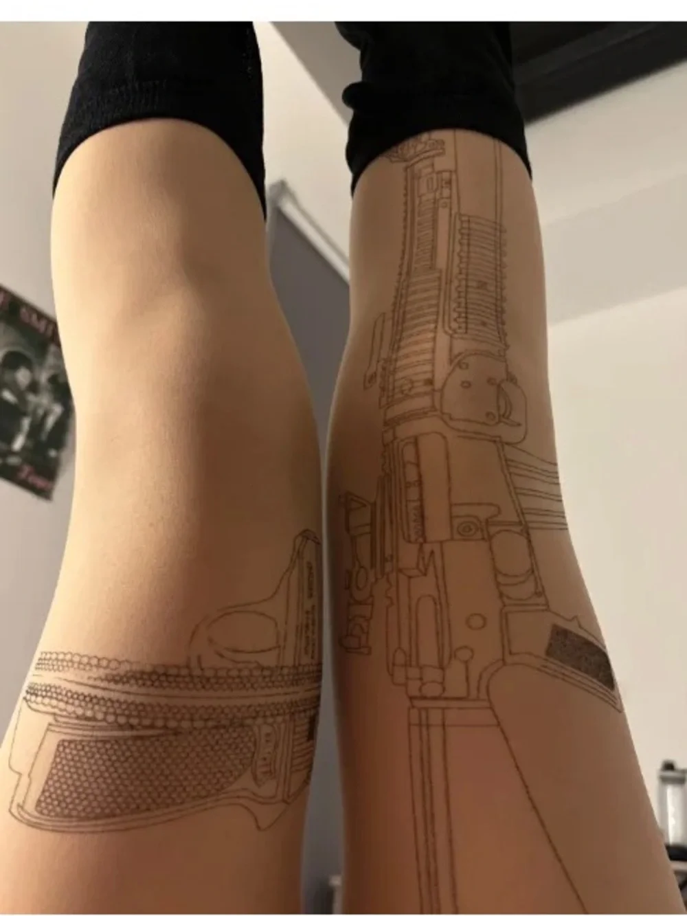 Sheer Nude Thigh-Highs with Hand Gun & Machine Gun Graphic Print tattoo